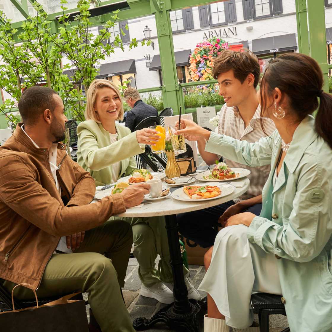 Group of friends enjoying lunch at Chez Margot
