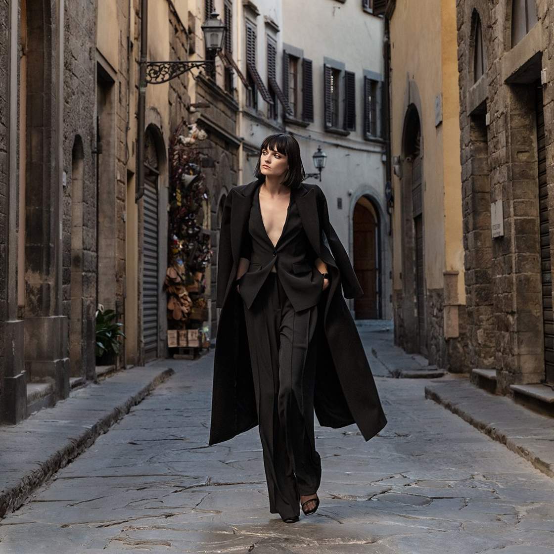 Sandro Ferrone brand image, a woman with black suit