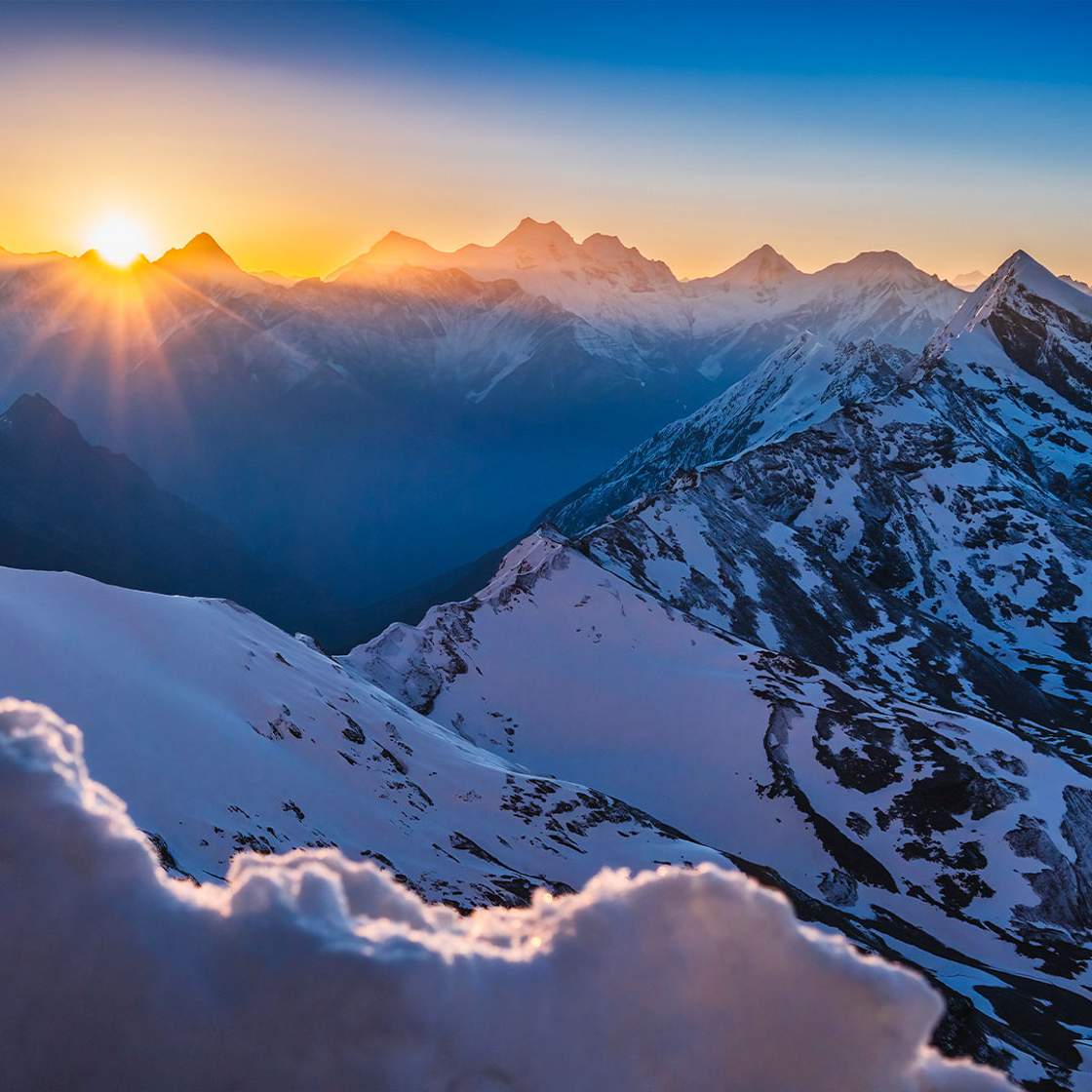 Scarpa sun rising in the mountains