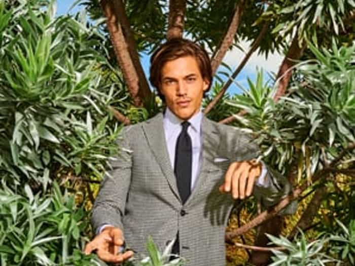 man in a checked suit