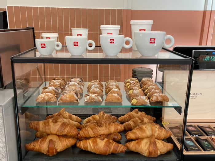 Image of pastries and coffee mugs
