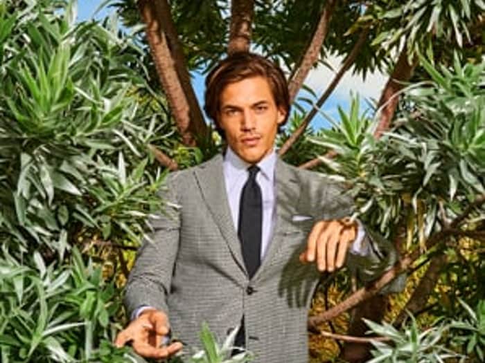 man in a checked suit