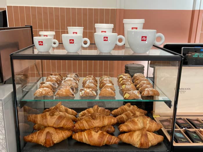 Image of pastries and coffee mugs