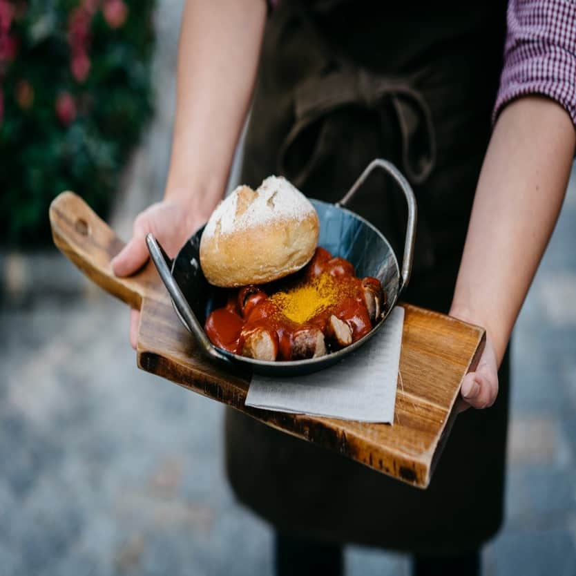 Sausage in a pan with bread