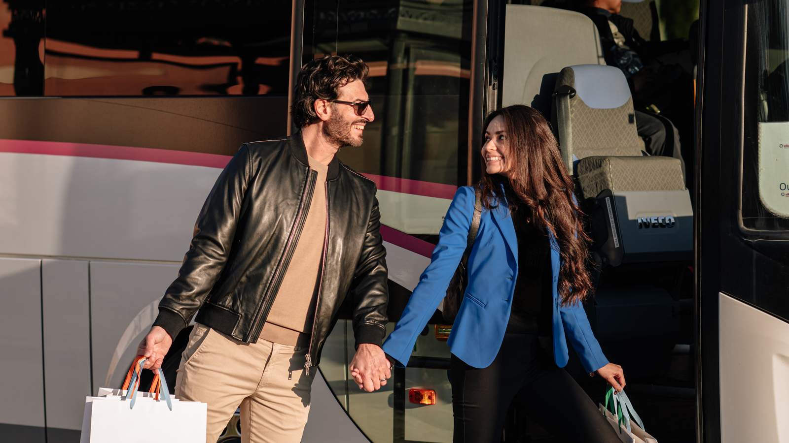 a girl and boy in a bus