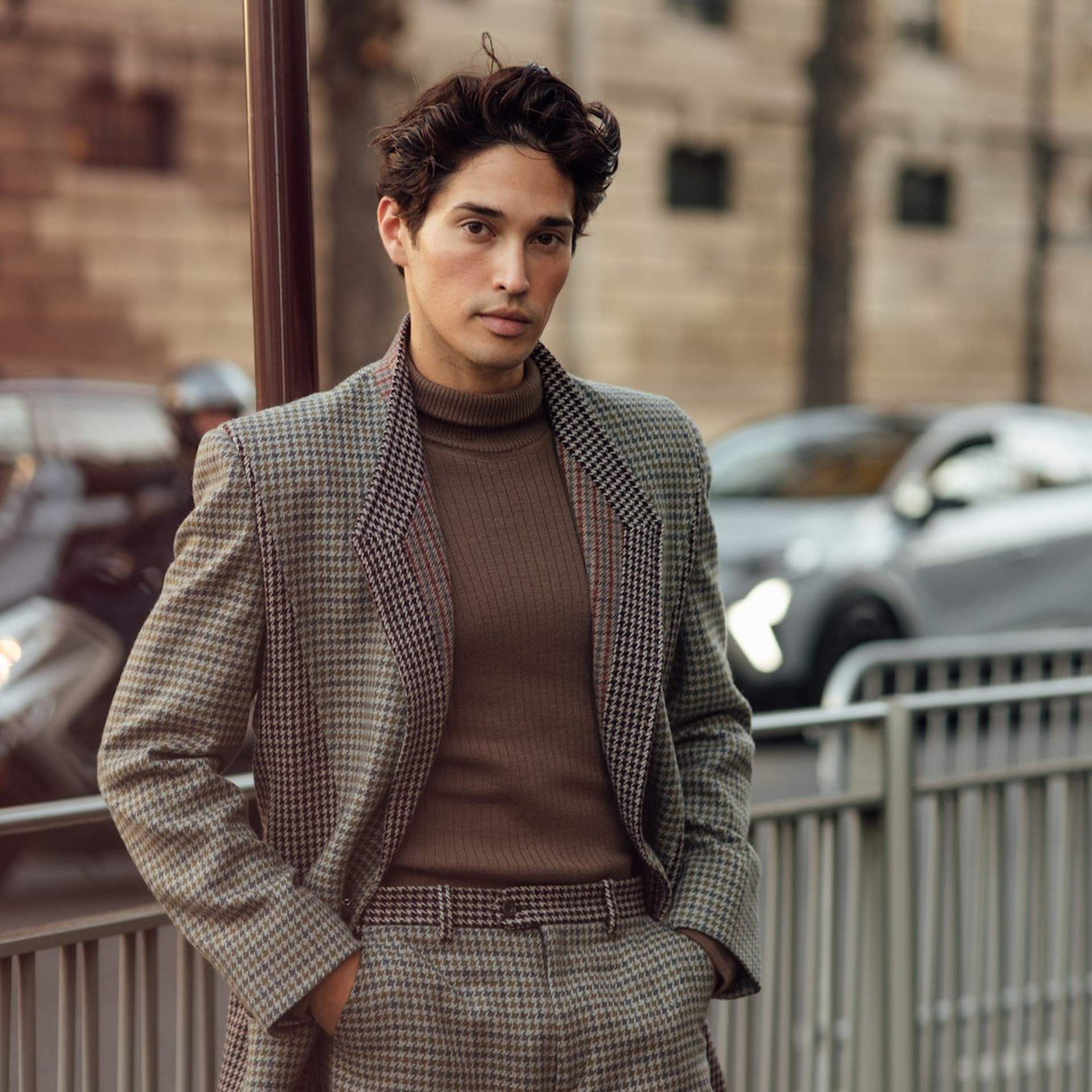 man in checked outfit