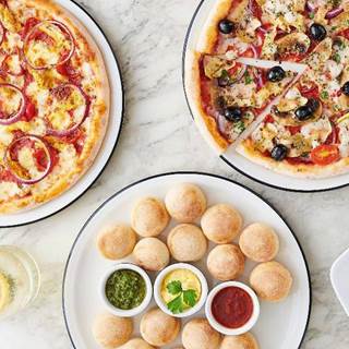 Buy a pizza and get a Classic pizza for £1 / All day, every day until 28th September! | Ts and Cs apply
